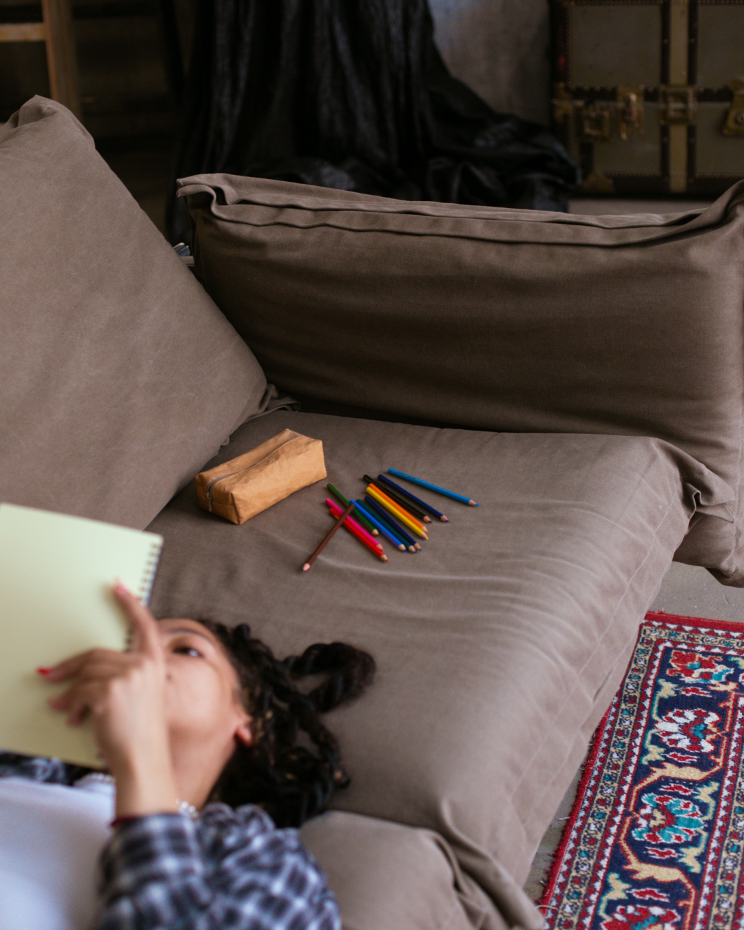 girl on couch emdr trauma anxiety somatic experiencing therapy counseling austin texas tampa bay st. petersburg florida fairfield connecticut teen girls young adult women burnout people-pleasing perfectionism
