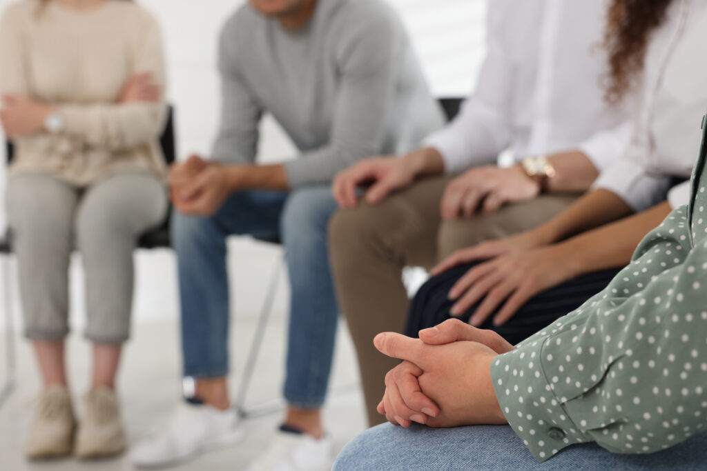 People at group therapy session indoors group therapy and counseling for women and teen girls in tampa bay florida, st. petersburg, connecticut, planation, austin texas