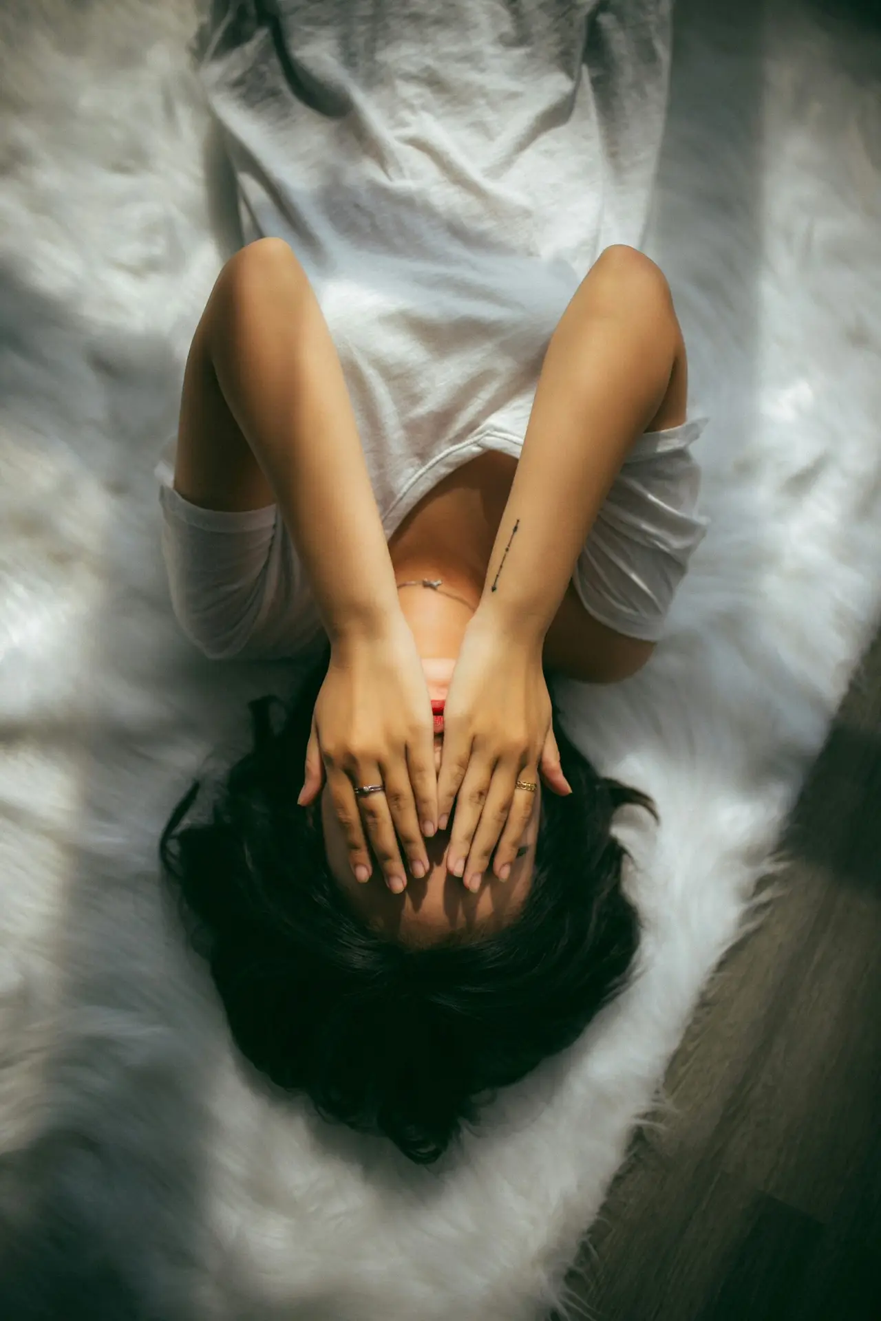 woman covering face sexual trauma therapy texas florida connecticut emdr somatic experiencing