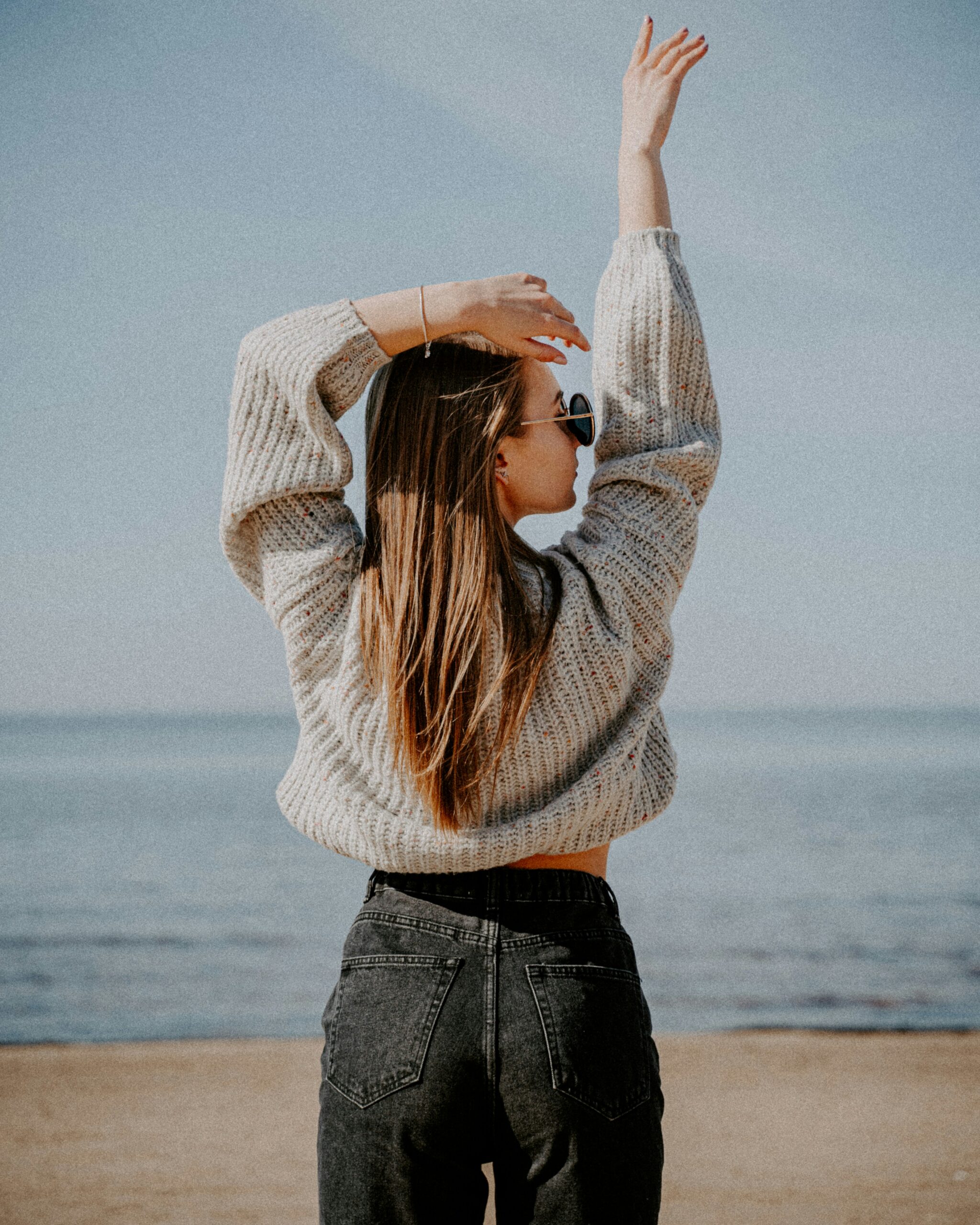 girl with arm raised therapy for young adult women teen girls austin texas tampa bay florida trauma somatic counseling