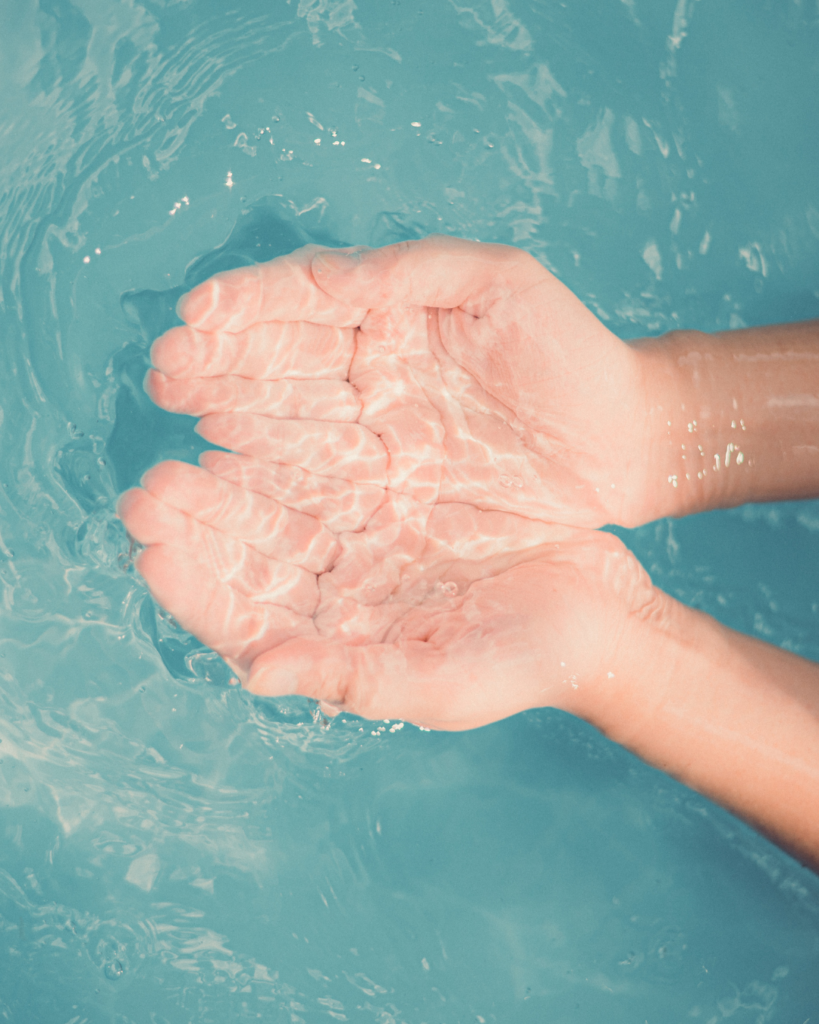 hands cupped together, truggling with perfectionism and anxiety